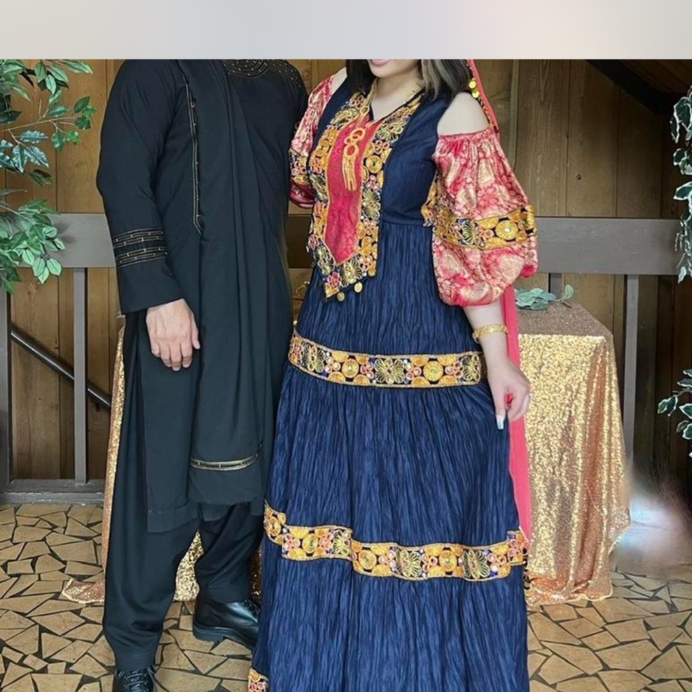 Colorful Traditional Dress with Embroidered Details